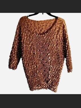 Soft burnt orange spandex type polyester top